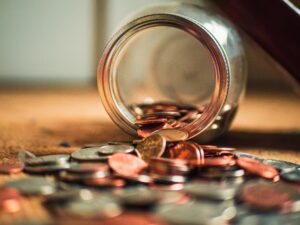 Jar of Coins Spilling Out